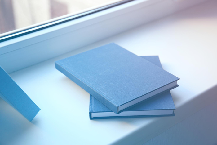hardcover-books-windowsill